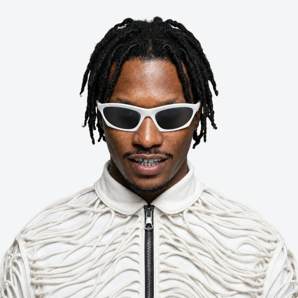 VYSER white cat-eye sunglasses with black lenses, styled with textured white zip-up jacket for modern streetwear look