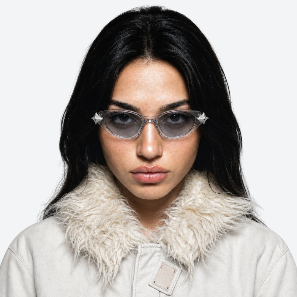Person wearing VYSER Sunglasses with unique STAR design on a white background