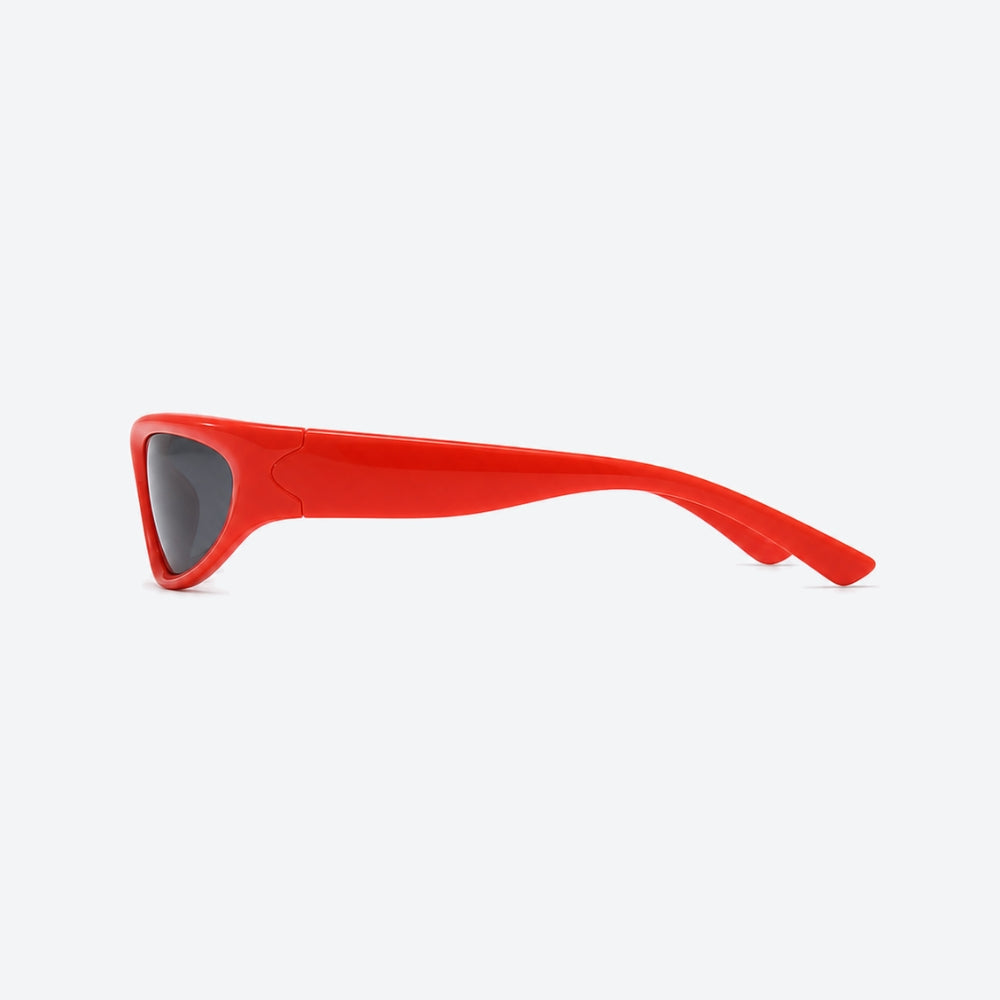 VYSER Red sunglasses with dark lenses on a white background