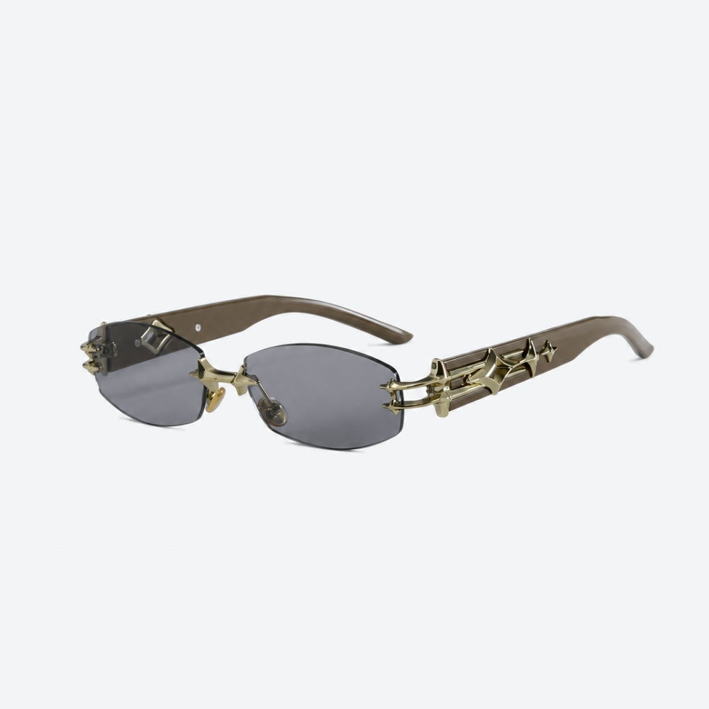 VYSER Sunglasses with decorative gold frame on a white background