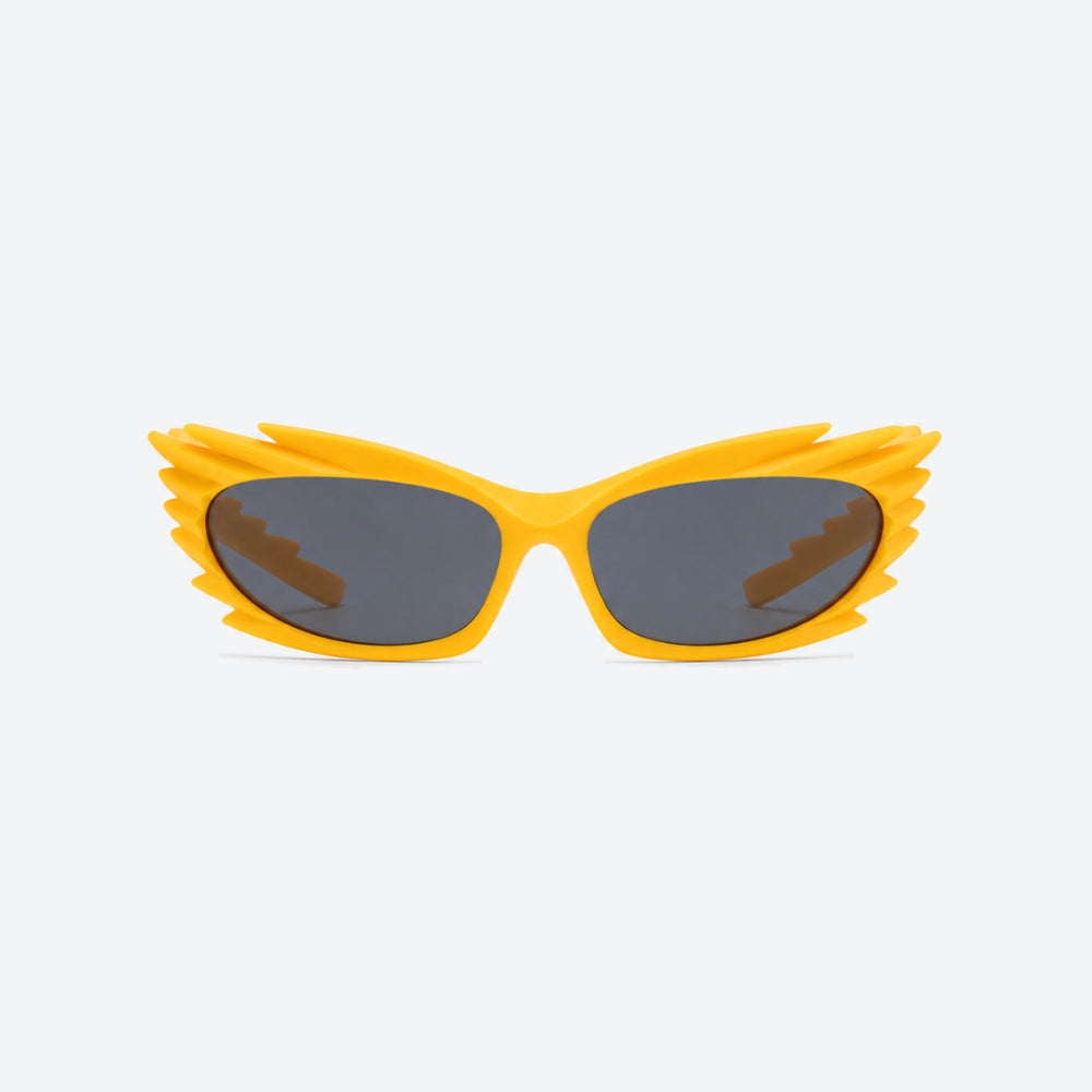 VYSER Yellow sunglasses with a unique frame design on a white background