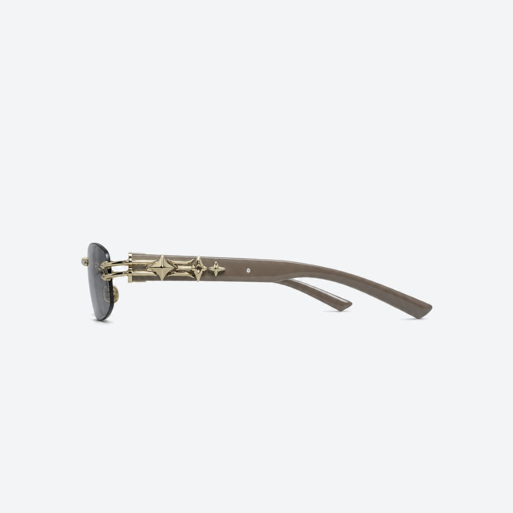 VYSER Sunglasses with decorative gold frame on a white background