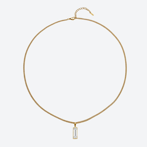 A gold chain necklace with a rectangular baguette-cut clear gemstone pendant, displayed on a clean light gray background.
