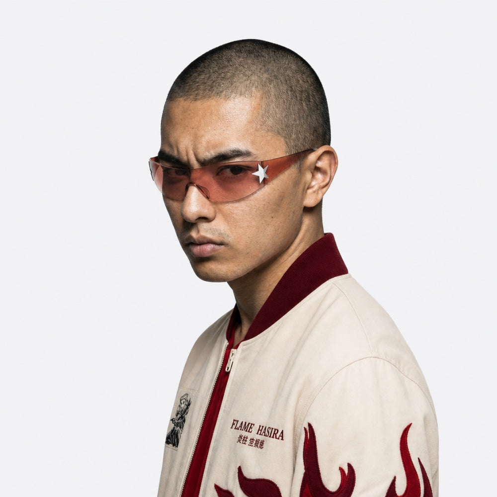 Person wearing a stylish outfit with a VYSER Sunglasses with a gradient brown lens on a white background