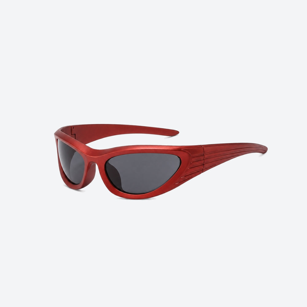 VYSER Red sunglasses with dark lenses on a white background