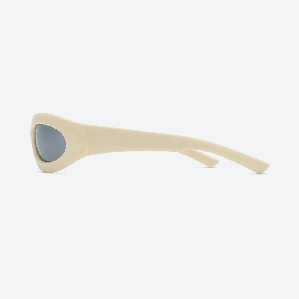 VYSER Beige sunglasses with gray lenses on a white background