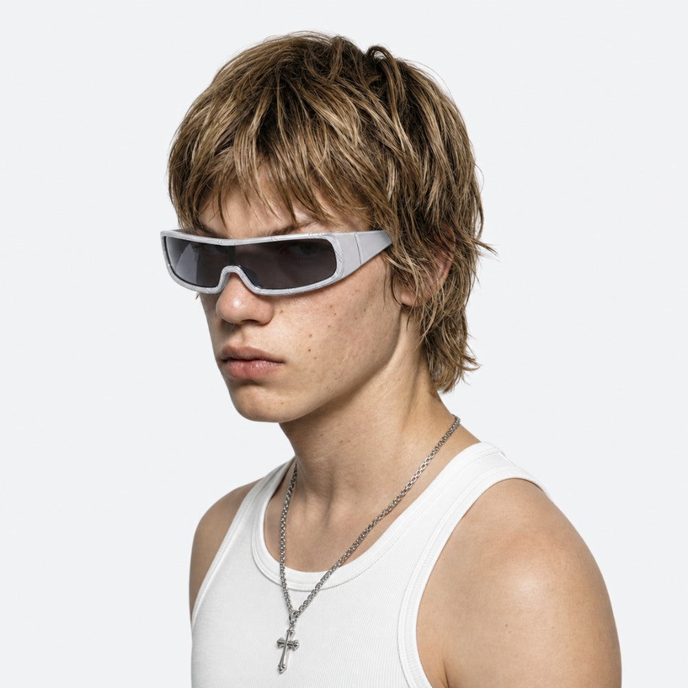 Person wearing VYSER White sunglasses with dark lenses on a white background