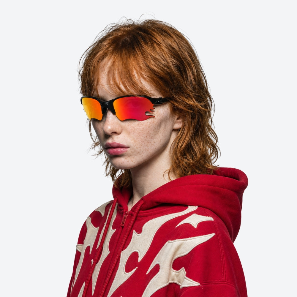 Person using VYSER Black sunglasses with redlenses on a white background