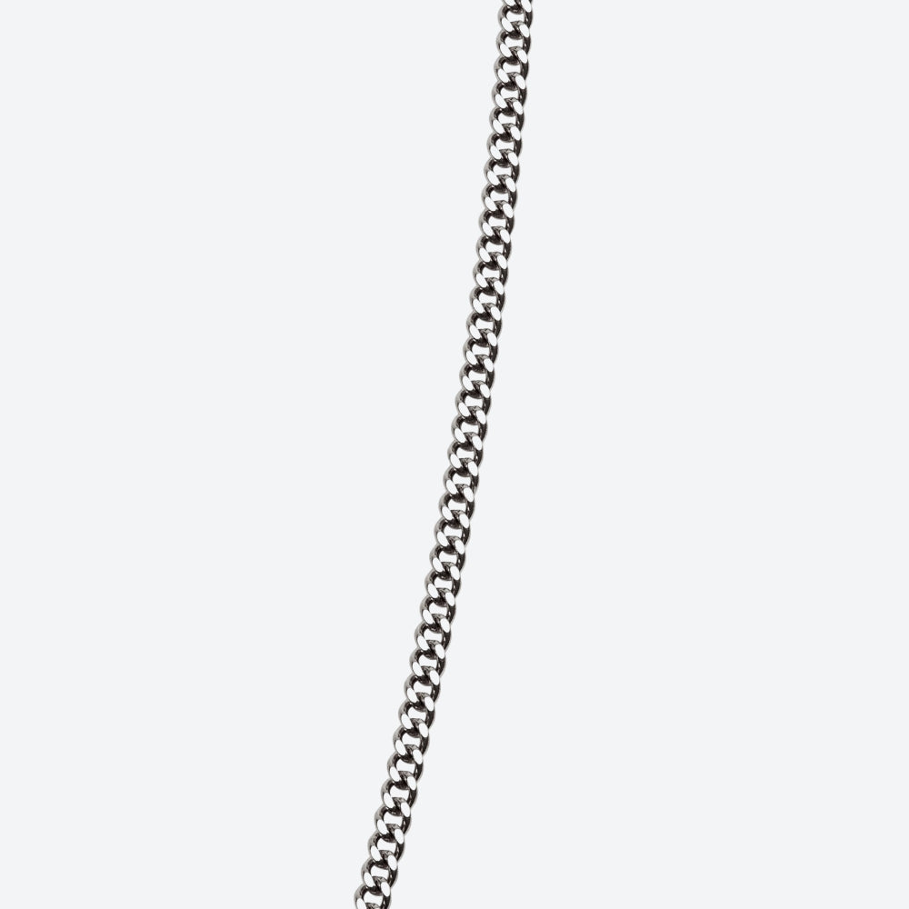 A close-up of a silver-toned metal chain running vertically down the center of a light gray background.
