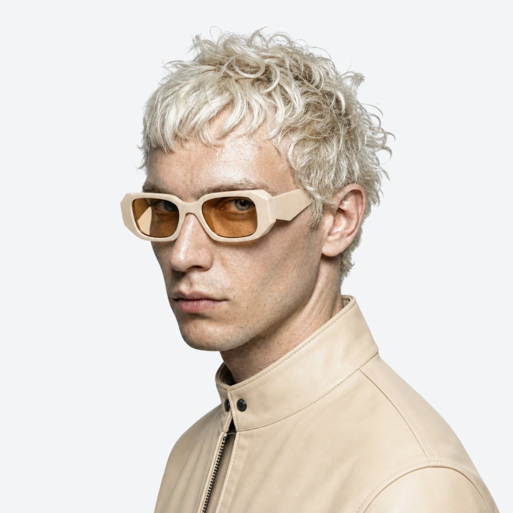 Person wearing VYSER Beige sunglasses with a white frame on a light beige background