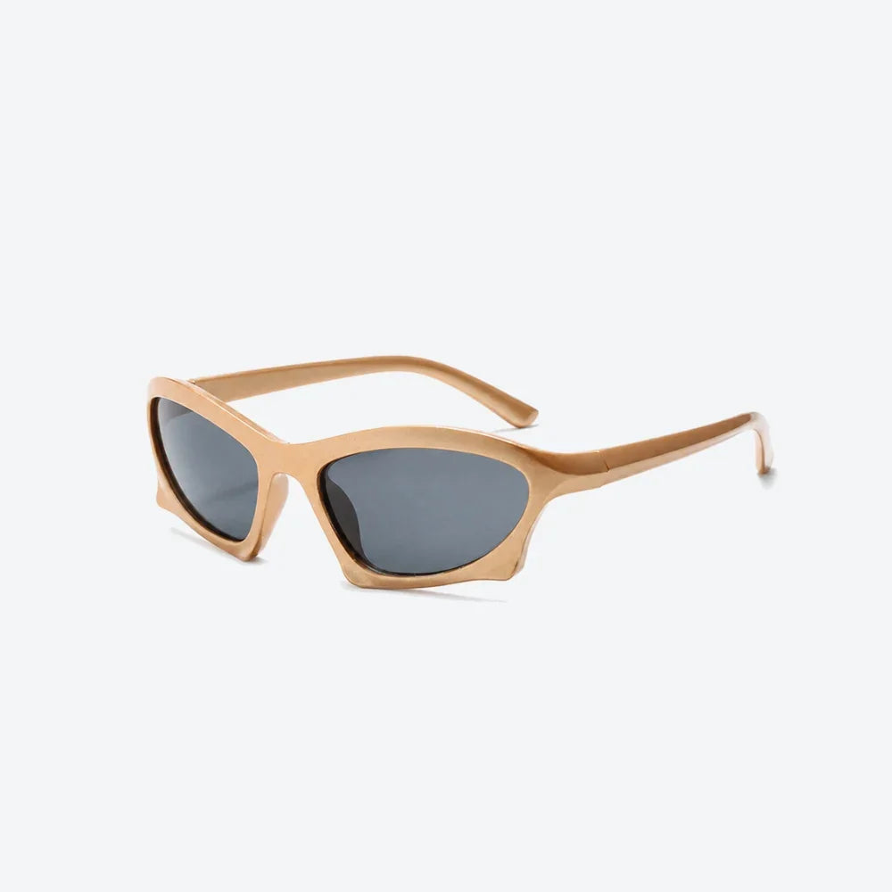 VYSER beige cat-eye sunglasses with dark lenses, modern streetwear style