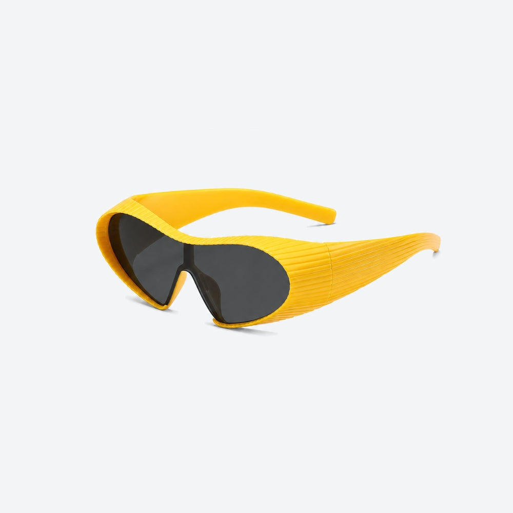 VYSER Yellow sunglasses with black lenses on a light gray background