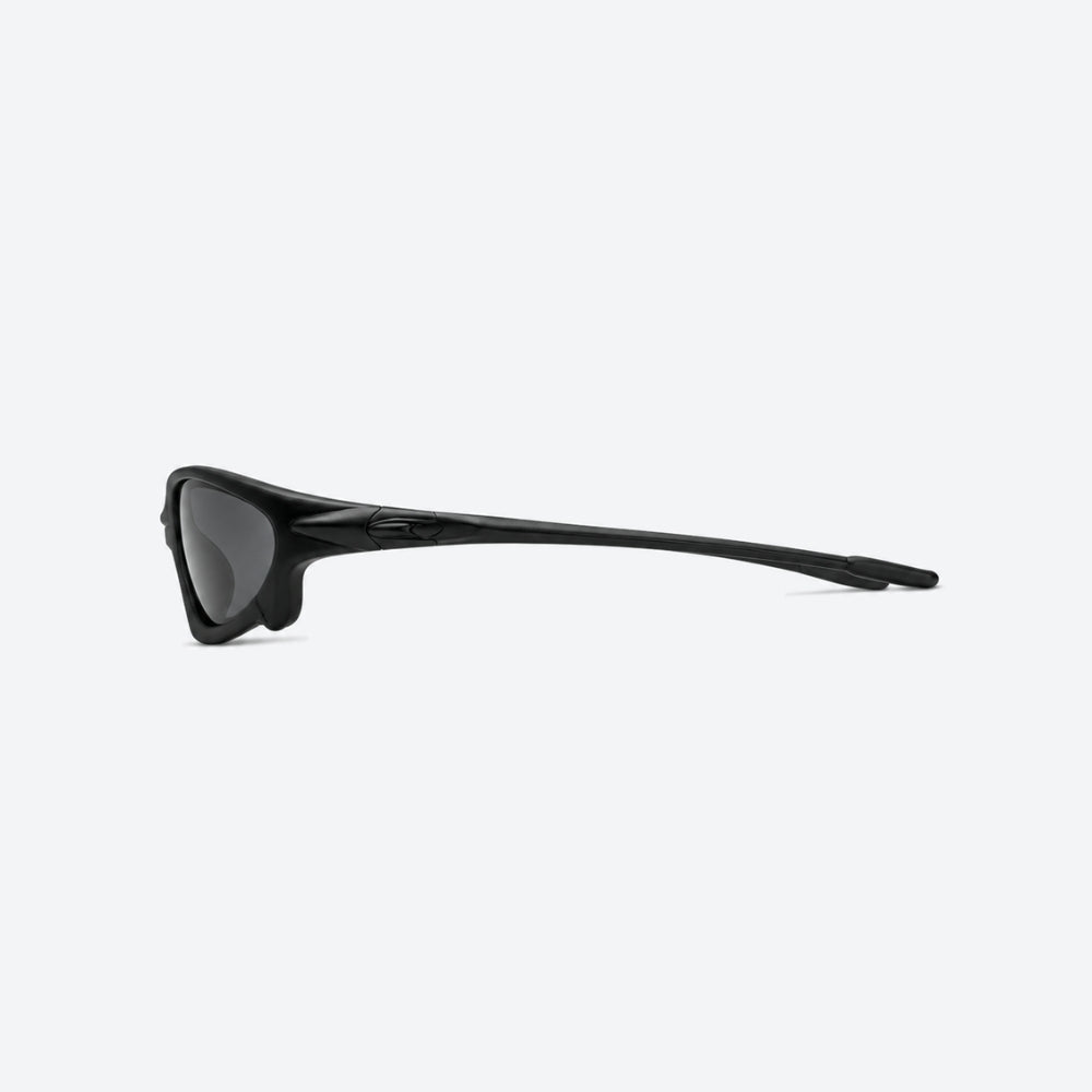 VYSER Sunglasses with a black frame and black lenses on a white background