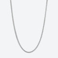 A silver-toned curb chain necklace shown against a plain light gray background.