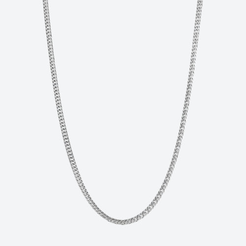 A silver-toned curb chain necklace shown against a plain light gray background.