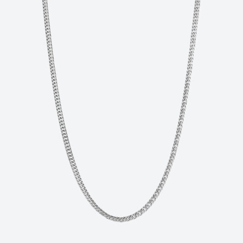 SILVER. A silver-toned Cuban curb chain necklace shown against a plain light gray background.