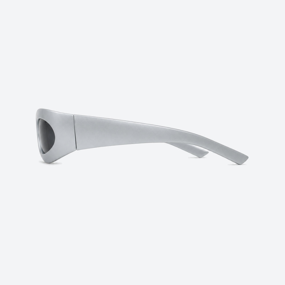 VYSER Silver sunglasses with dark lenses on a white background