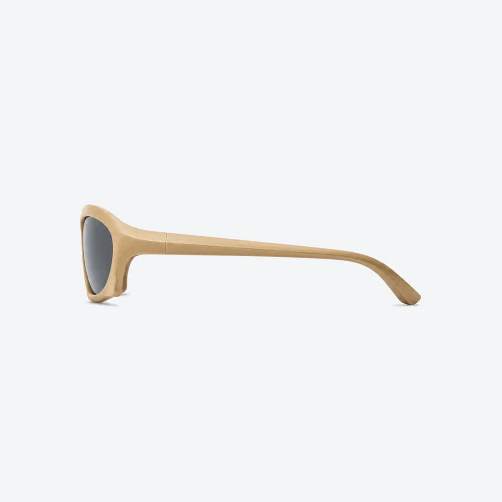 VYSER beige acetate sunglasses with sleek angular frame and dark gray lenses, minimalist streetwear style.