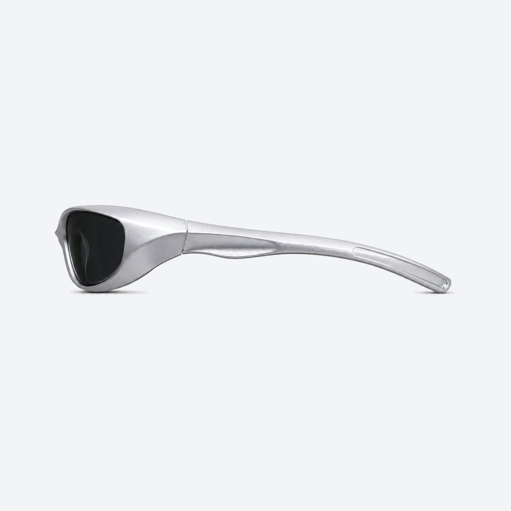 VYSER Silver sunglasses with dark lenses on a white background