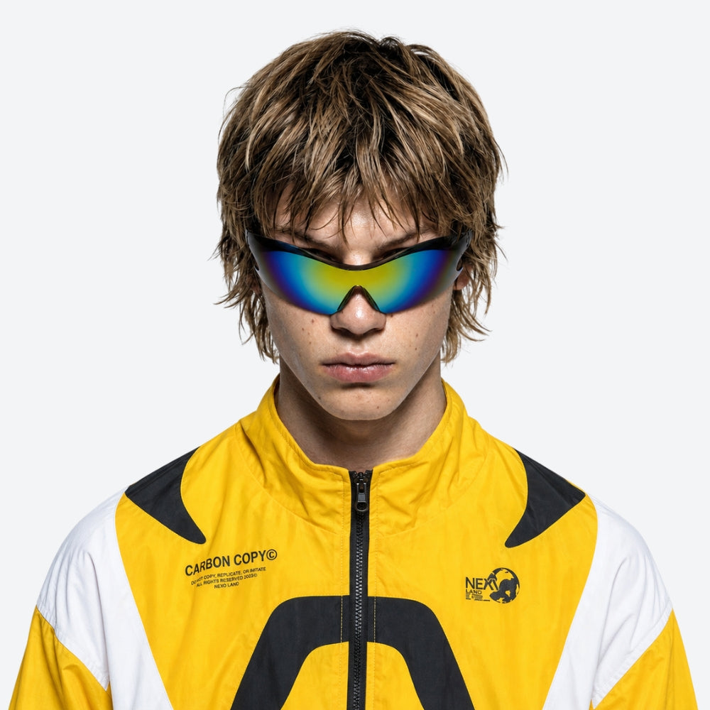 Person wearing a VYSER Sunglasses with reflective blue and green lenses on a white background