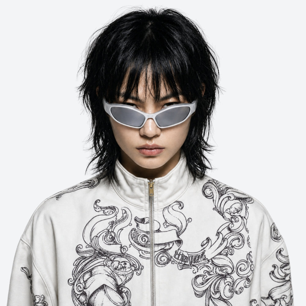 Person wearing a white jacket with black patterns and VYSER White sunglasses on a white background