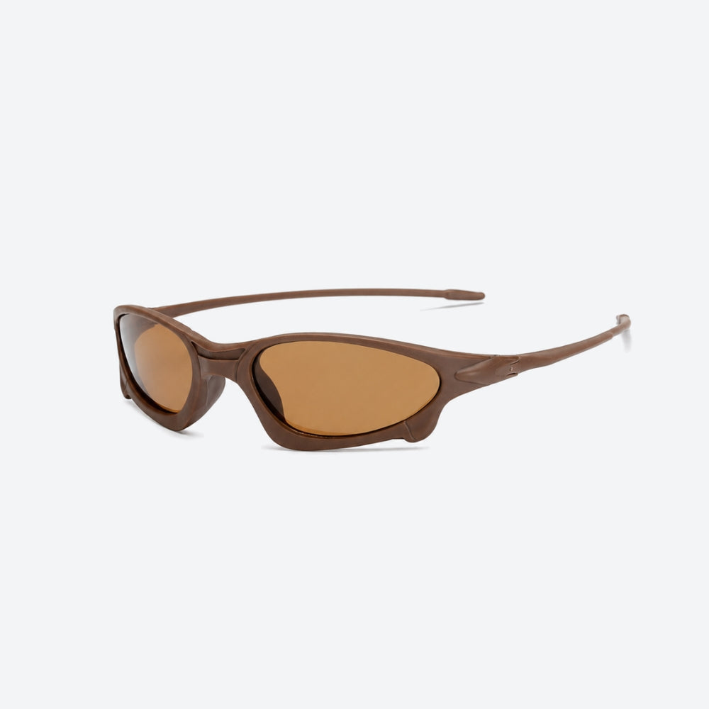 VYSER Brown sunglasses with brown lenses on a white background