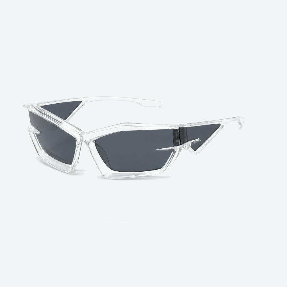 VYSER Clear sunglasses with dark lenses on a light gray background