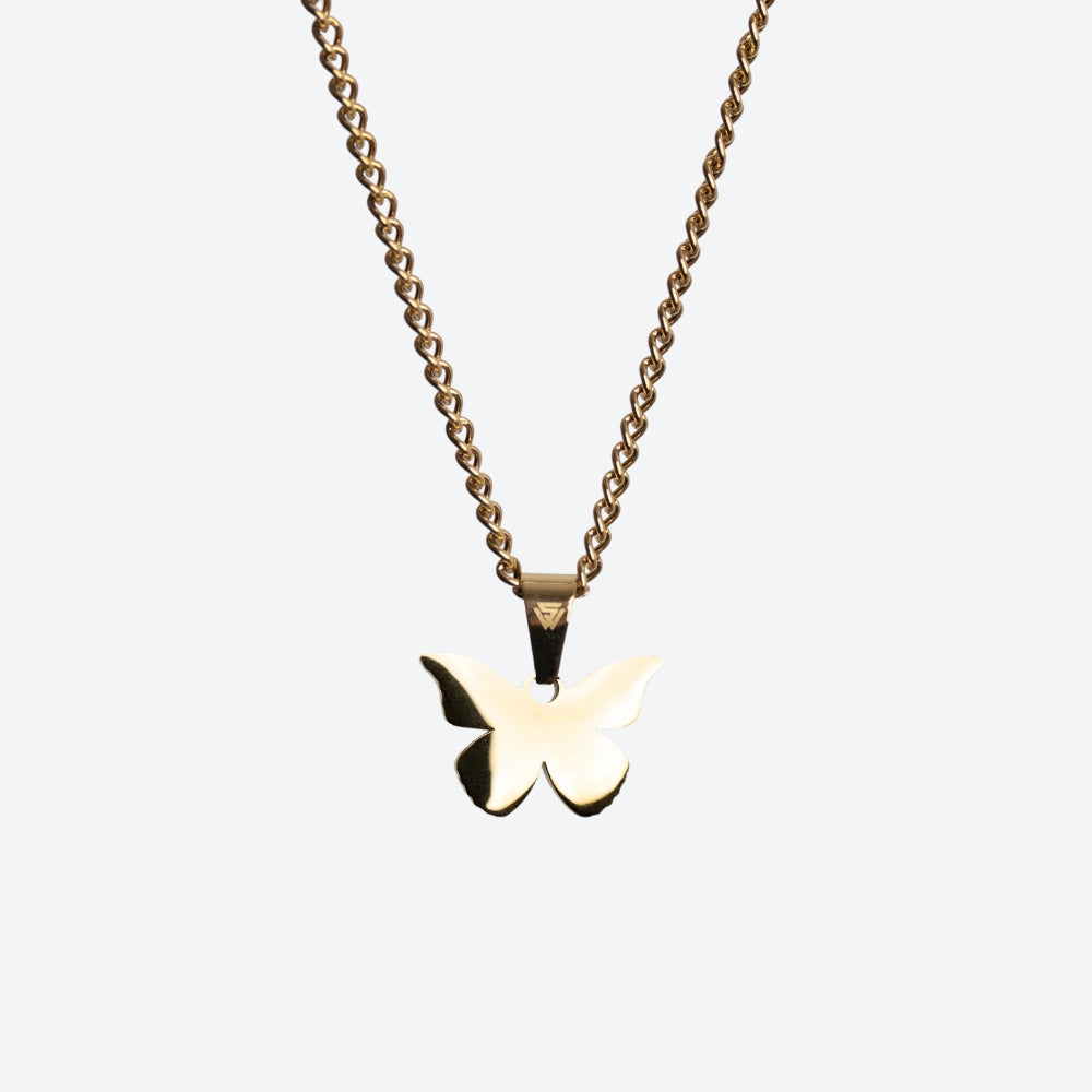 A gold butterfly pendant necklace on a matching gold chain, shown against a plain light gray background.