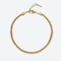 A gold-toned curb chain bracelet with a lobster clasp and extension chain, displayed on a clean white background.