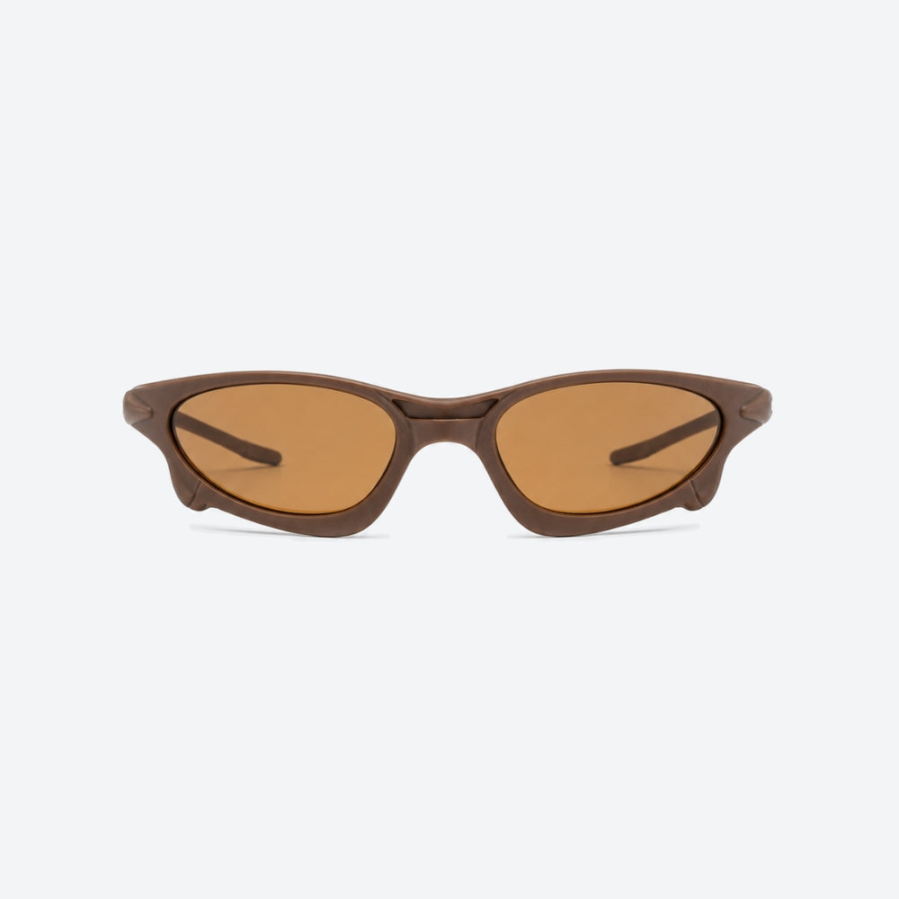 VYSER Brown sunglasses with brown lenses on a white background