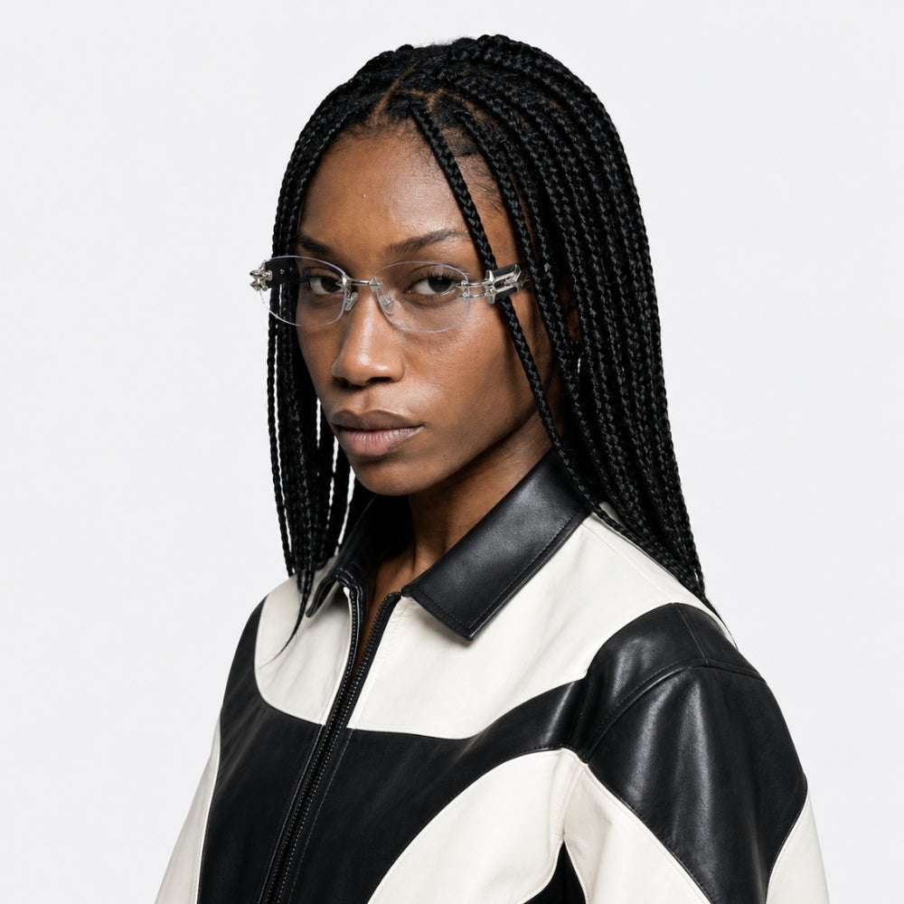 Person wearing VYSER Black with transparent lens a white background