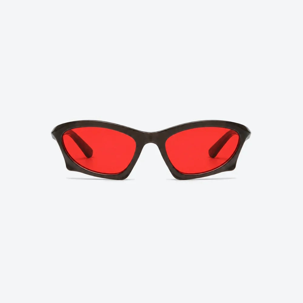 VYSER bold red-lens sunglasses with sleek black acetate frame, modern streetwear style.