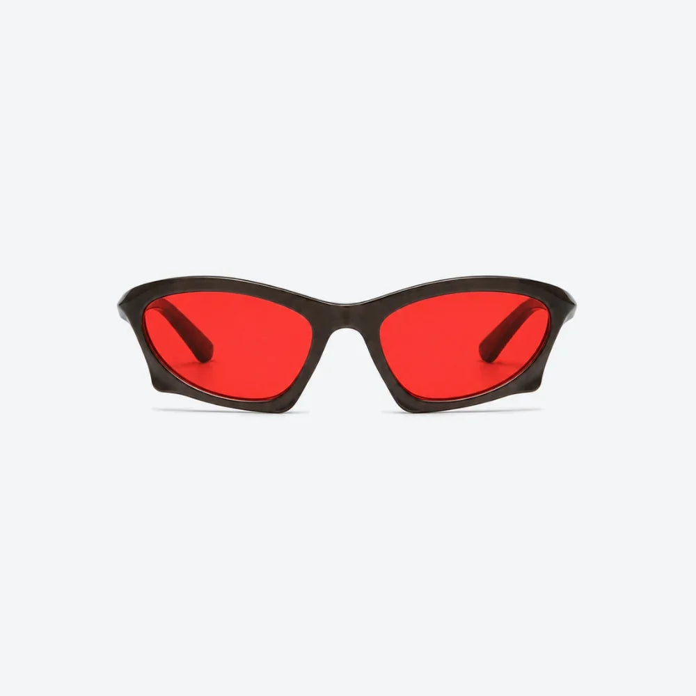 VYSER bold red-lens sunglasses with sleek black acetate frame, modern streetwear style.