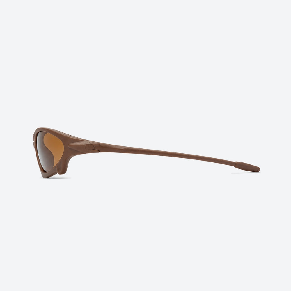 VYSER Brown sunglasses with brown lenses on a white background