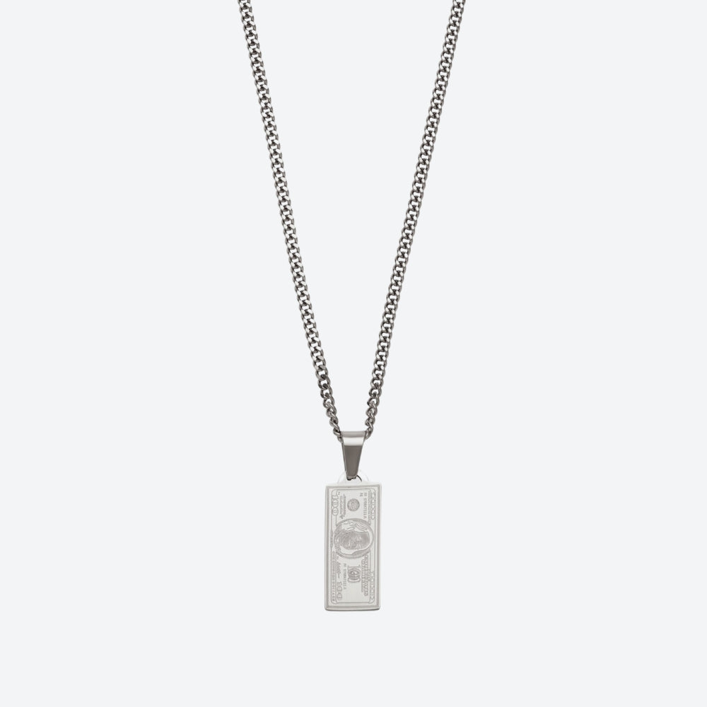 A silver-toned chain necklace with a rectangular pendant shaped like a U.S.