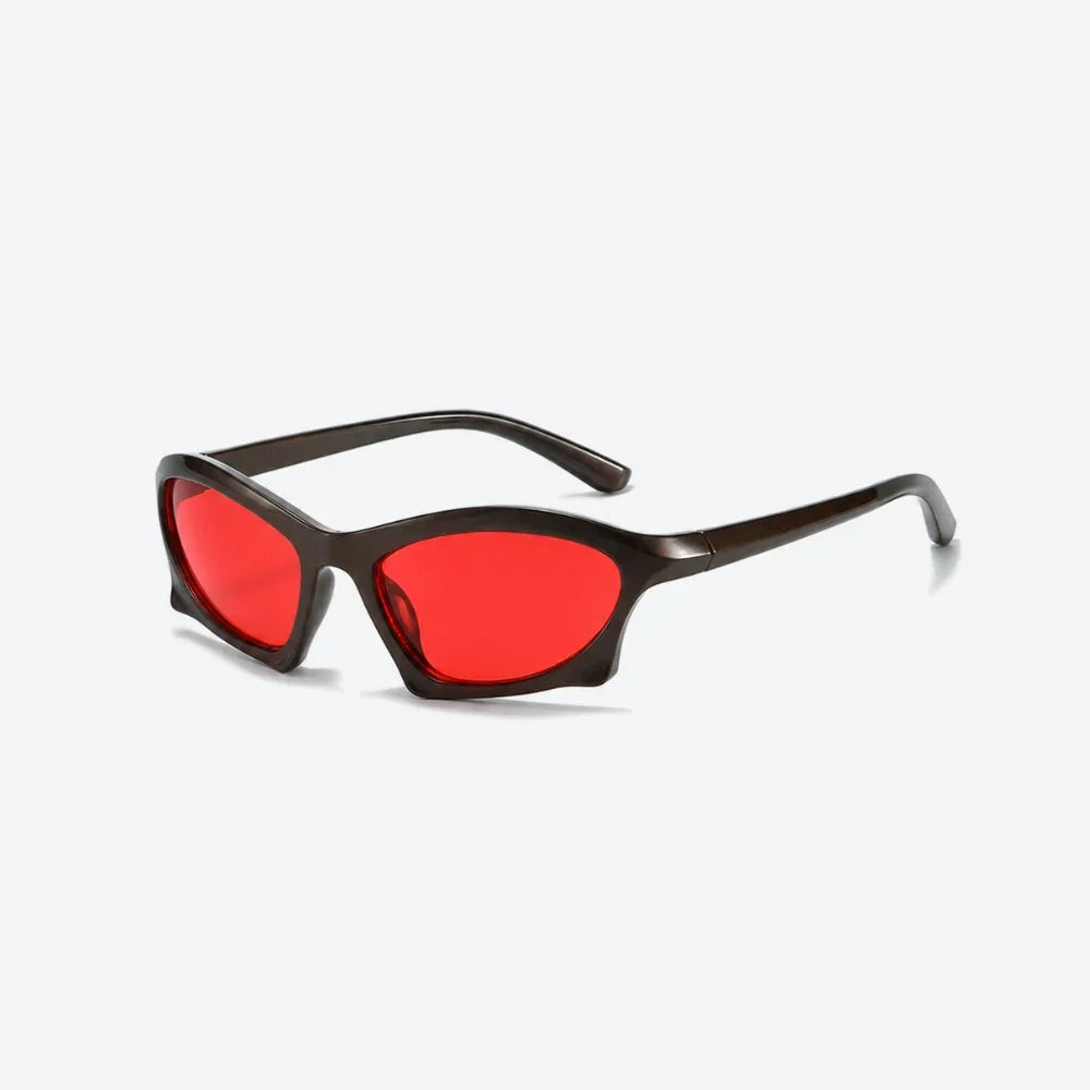 VYSER bold red-lens sunglasses with dark acetate frame, modern cat-eye streetwear style.