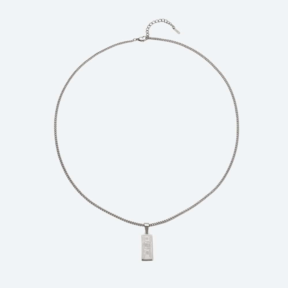 A silver chain necklace with a rectangular pendant featuring the word 'STUDY' in a vertical stack, displayed against a light gray background.