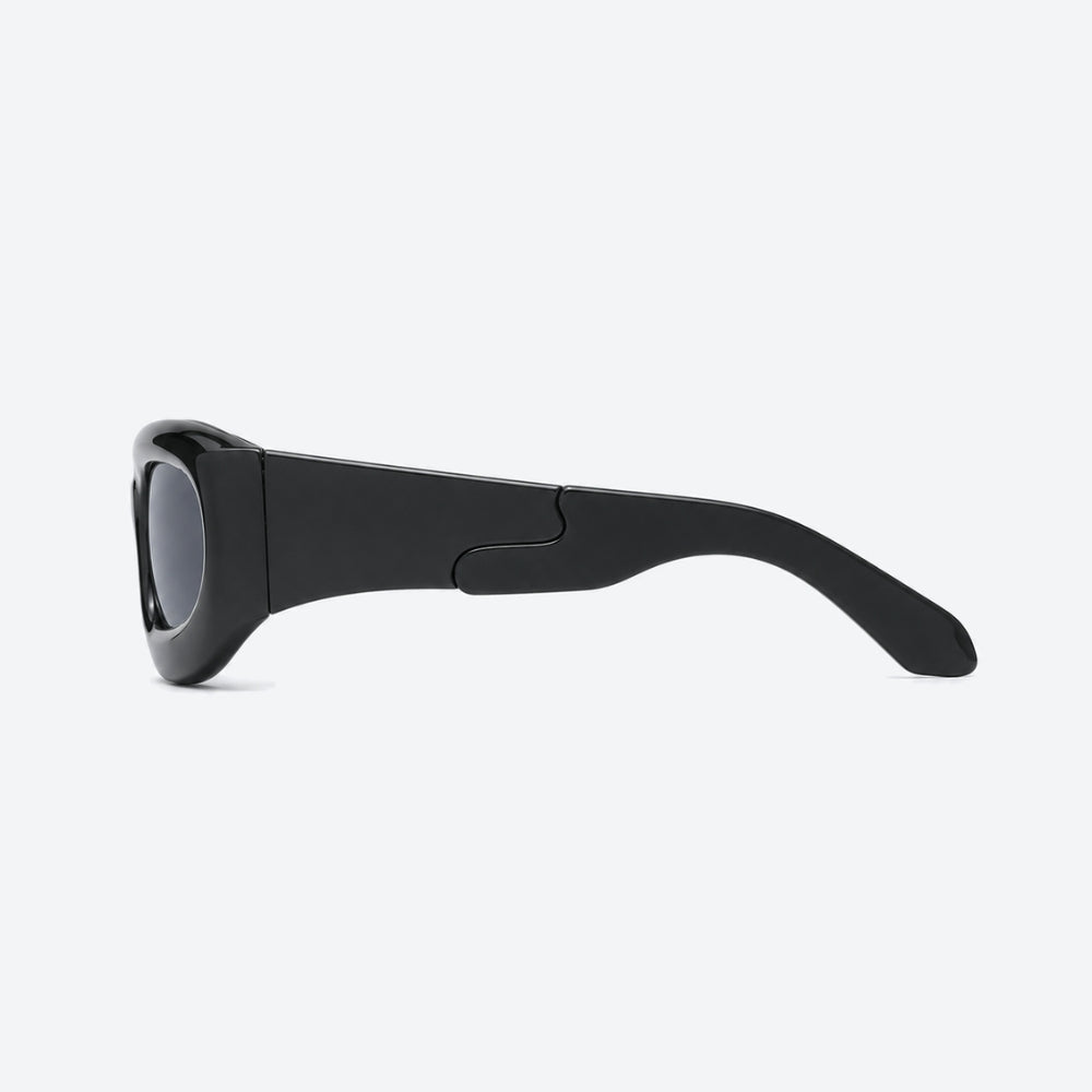 VYSER Black sunglasses with dark lenses on a white background