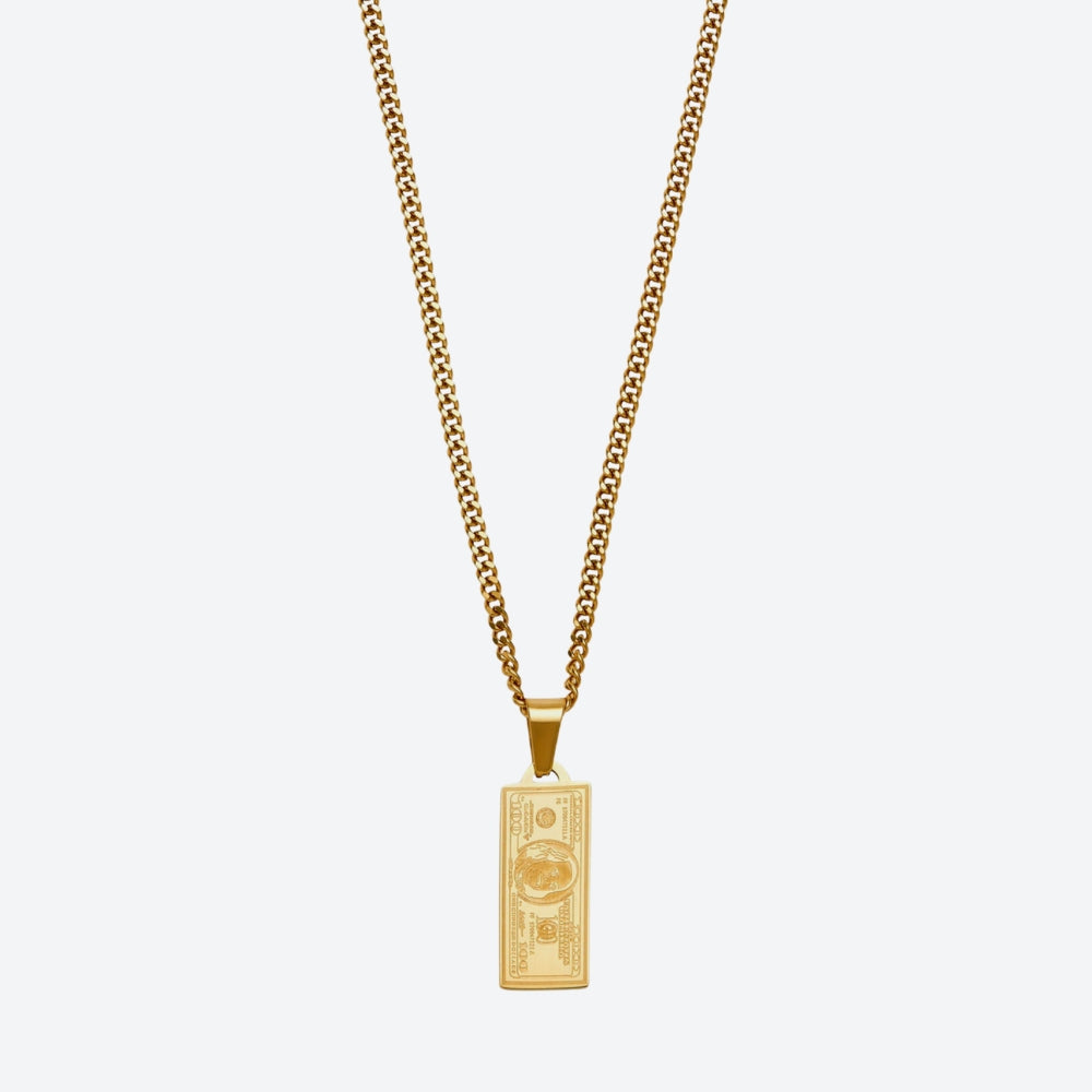 A gold-toned chain necklace with a rectangular pendant designed to look like a U.S.