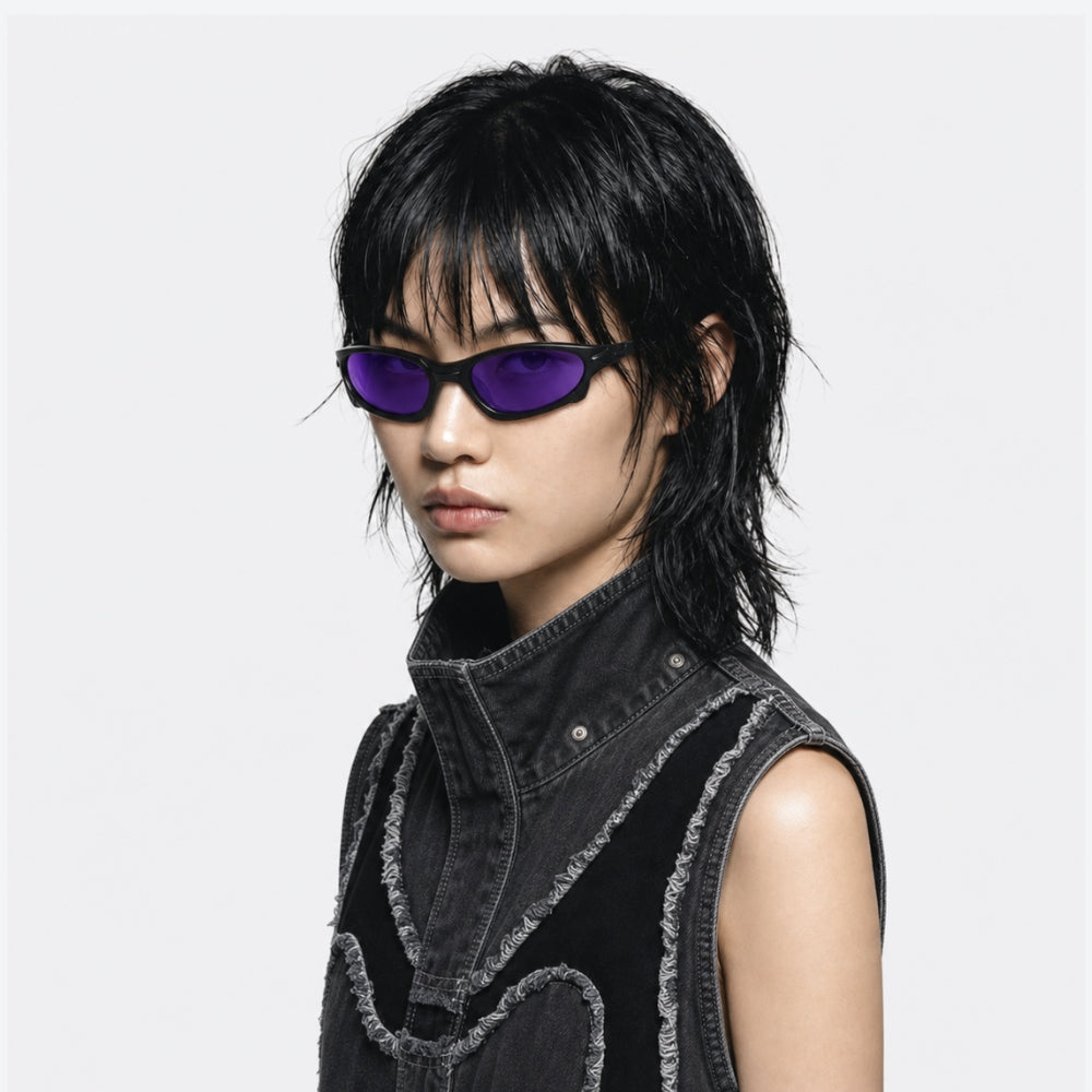 Person wearing VYSER Sunglasses with a black frame and purple lenses on a white background