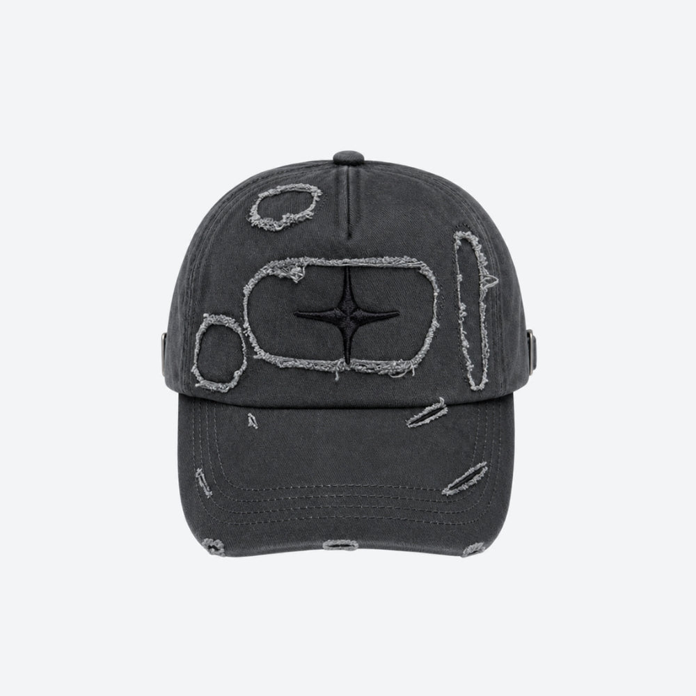A dark gray distressed baseball cap with a central black star logo surrounded by a rough white outline, shown against a plain light gray background.