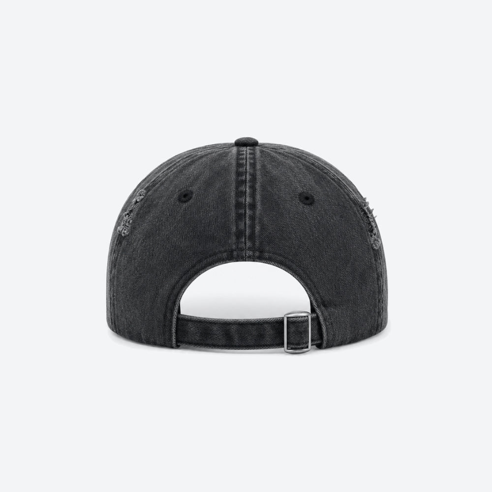 Back view of a washed black baseball cap with an adjustable buckle strap
