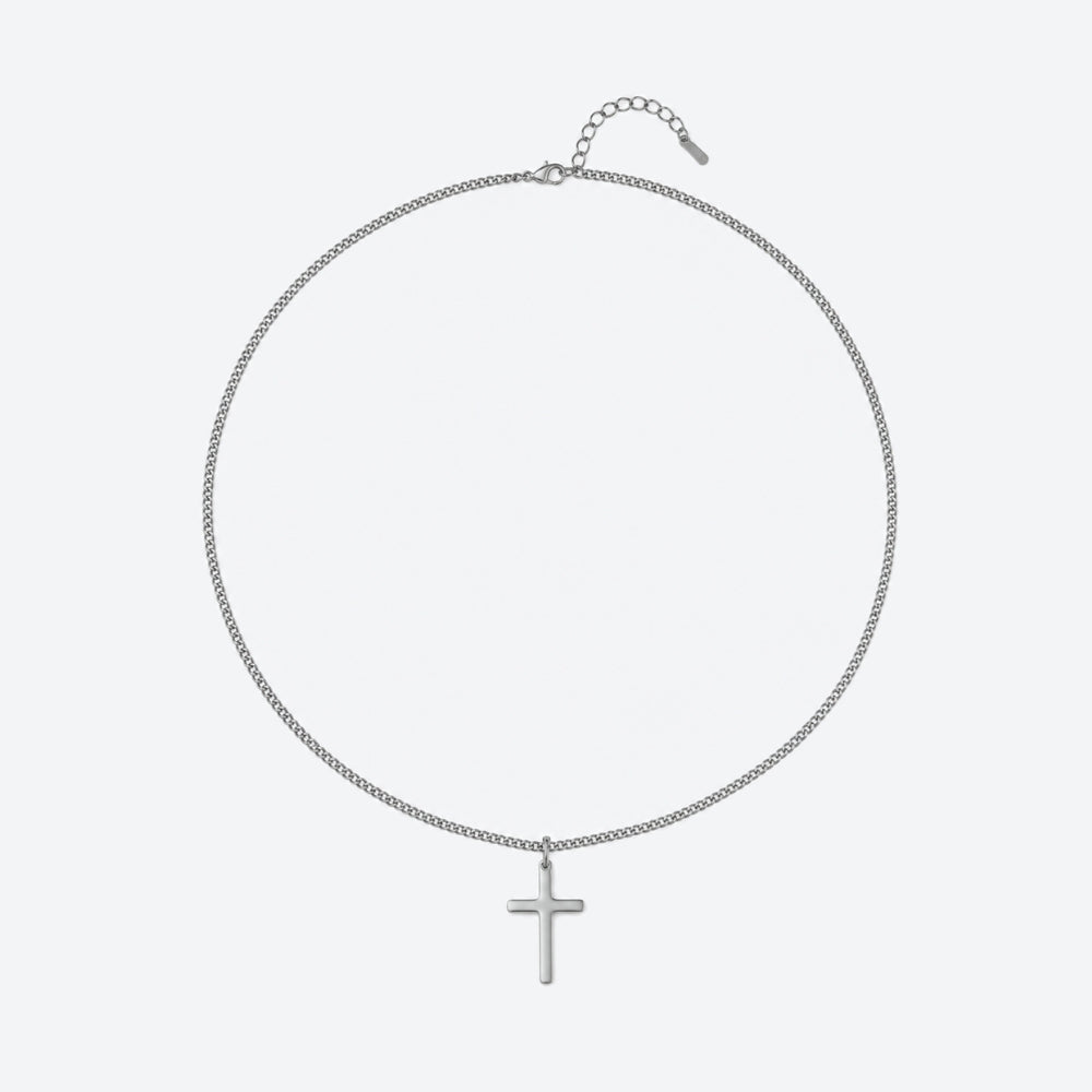 A silver chain necklace with a small cross pendant, displayed on a light gray background.