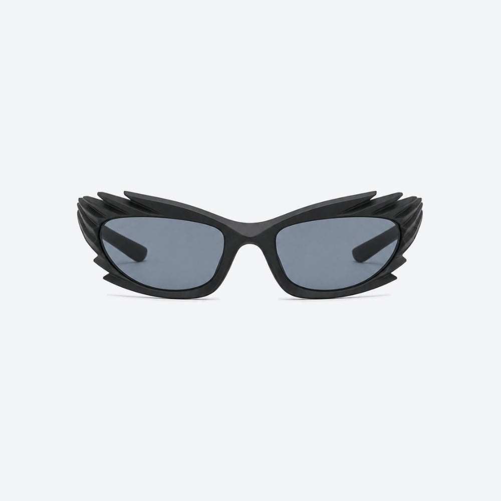 VYSER Black sunglasses with unique frame design on a white background