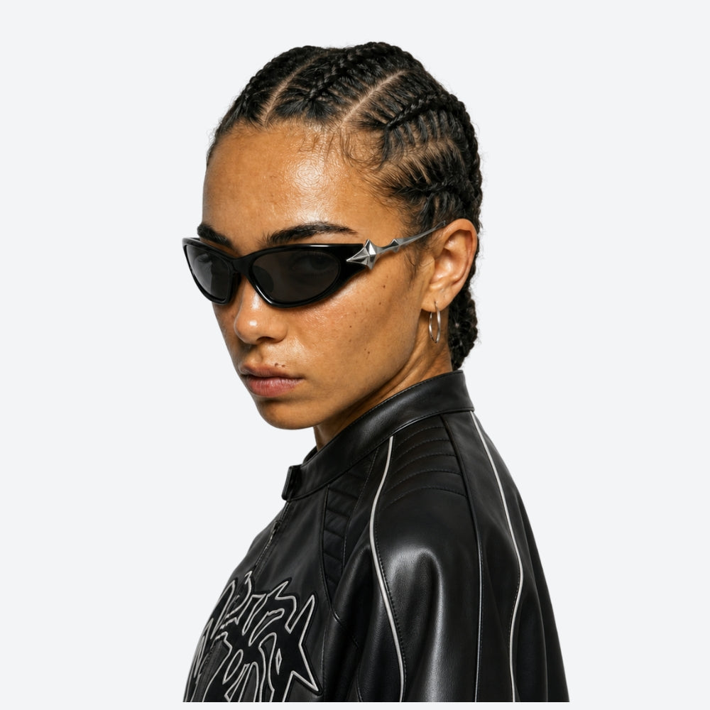 Person wearing VYSER Sunglasses with unique STAR design on a white background