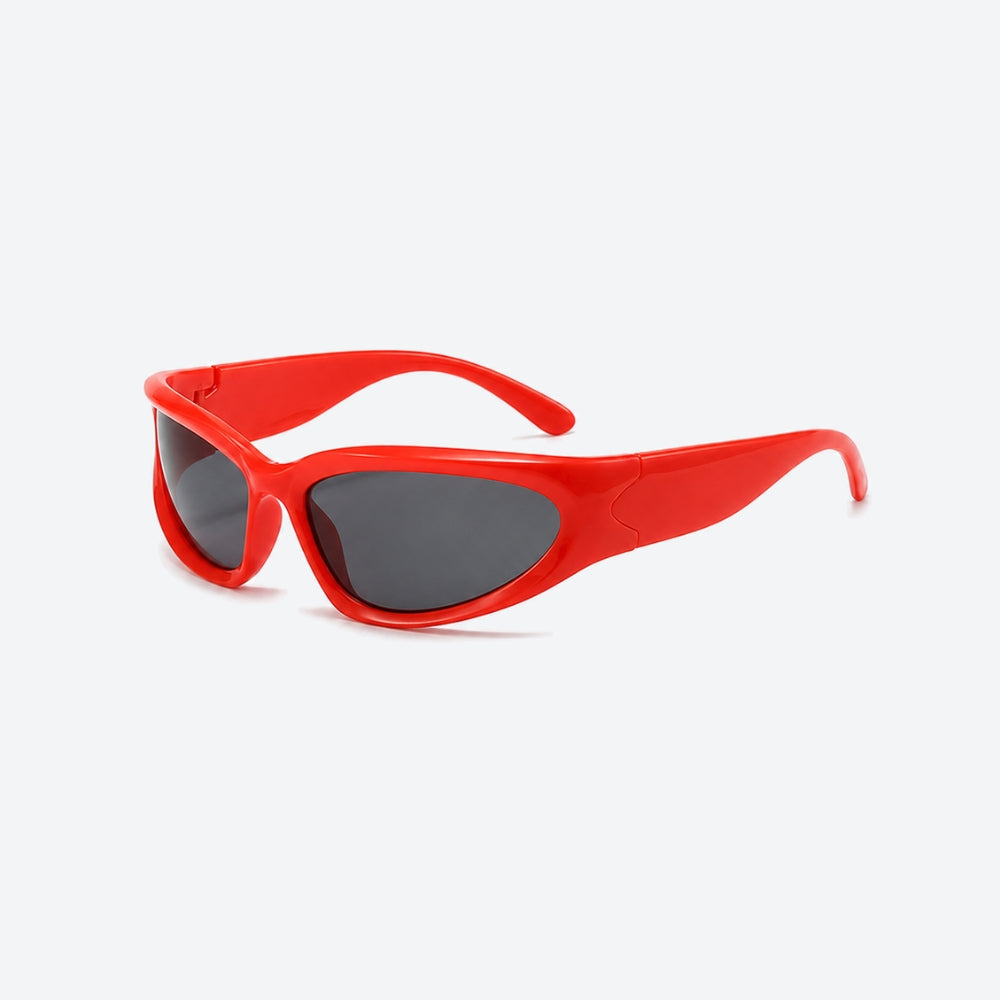 VYSER Red sunglasses with dark lenses on a white background