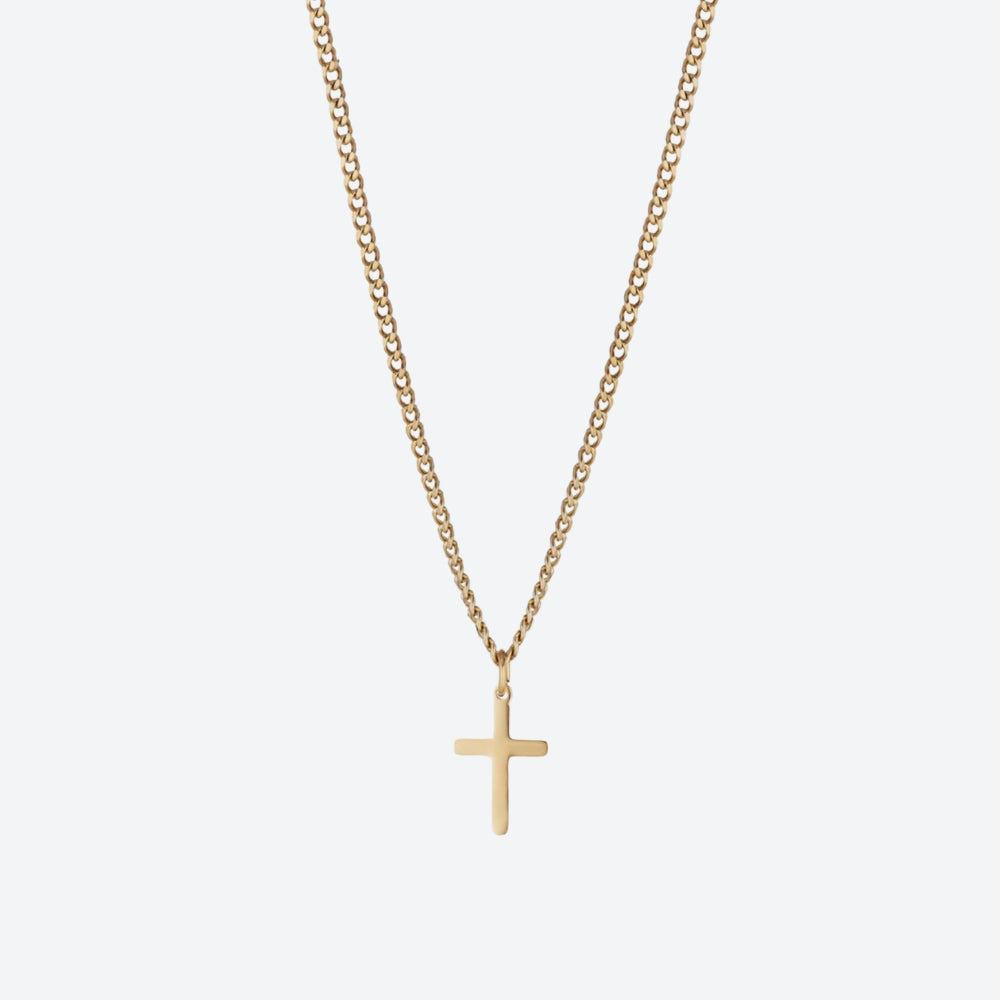 A delicate gold chain necklace with a small, minimalist cross pendant, displayed against a clean, light gray background.