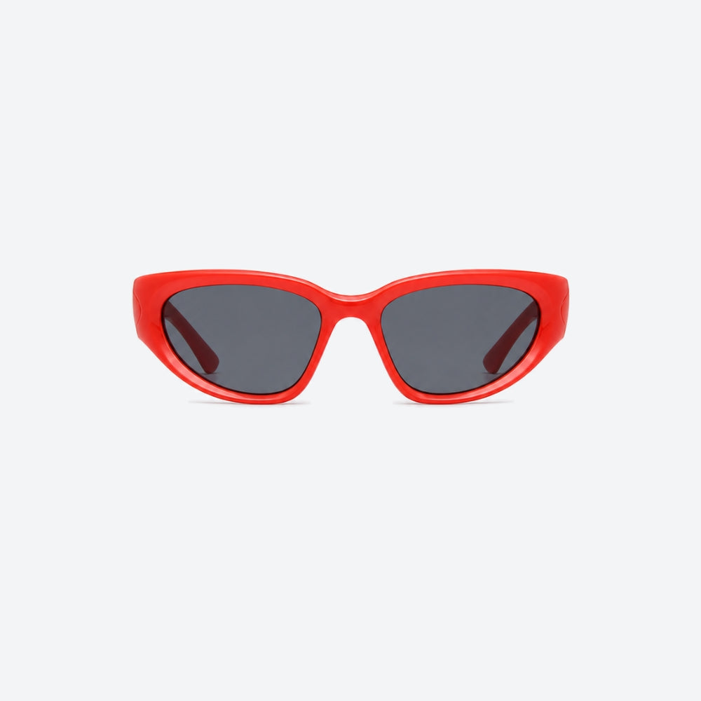 VYSER Red sunglasses with dark lenses on a white background