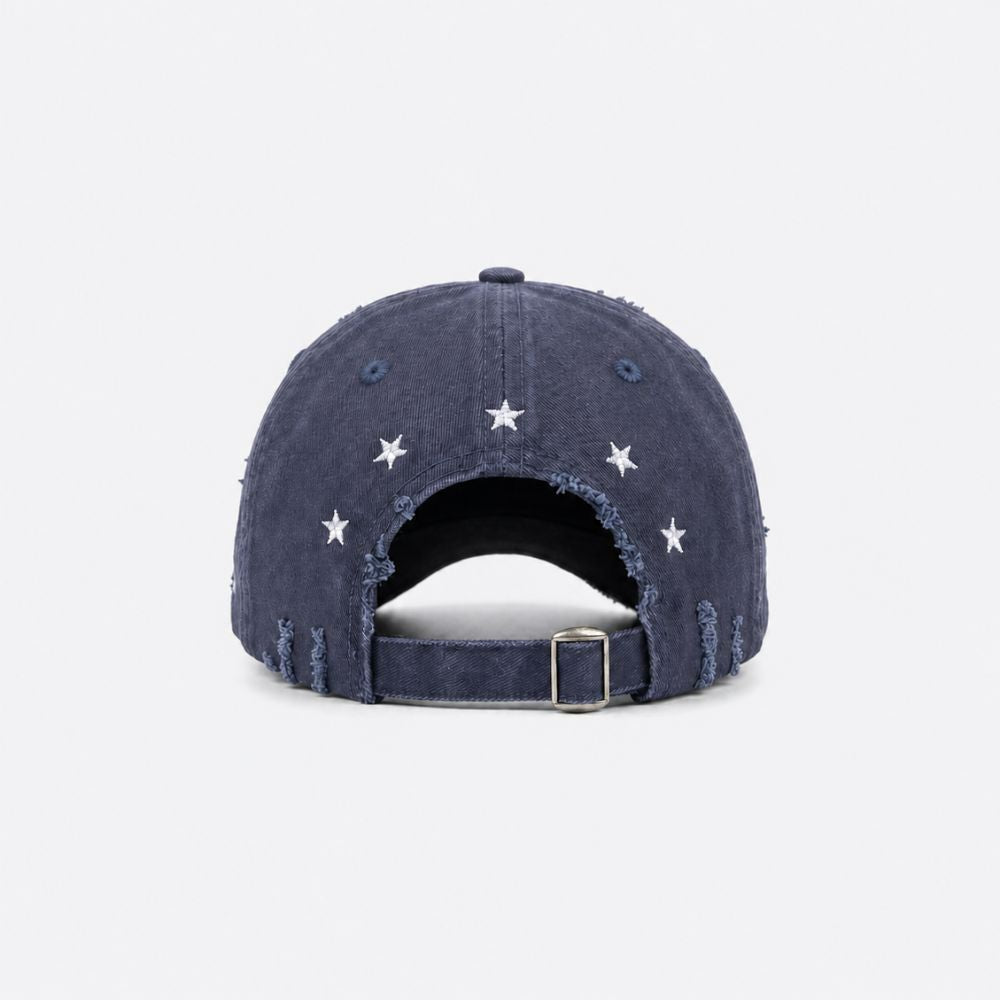 Back view of a navy blue distressed baseball cap with small embroidered stars and an adjustable buckle strap