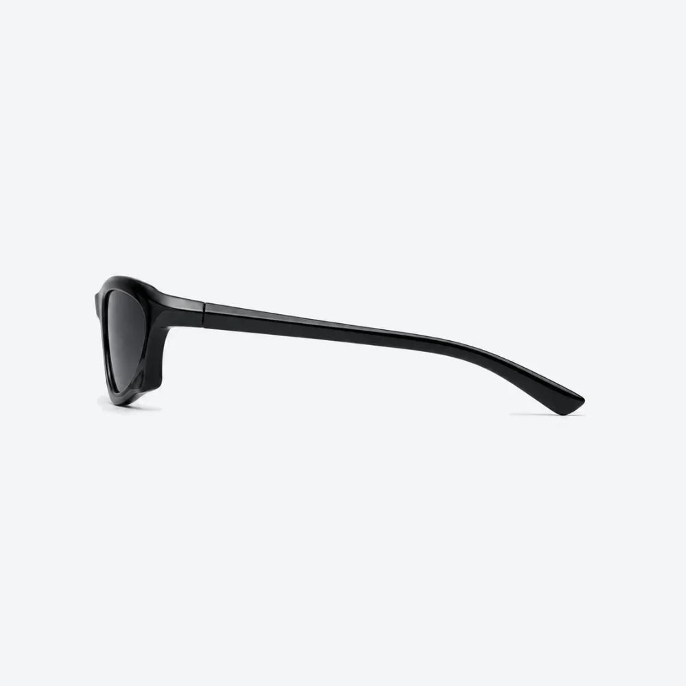 VYSER black acetate sunglasses with sleek angular frame and dark lenses, minimalist streetwear style.